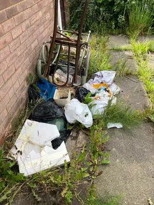 Garage rubbish before removal from a property in St Helens