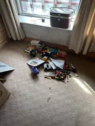 Clutter ready for removal during a house clearance in Rainhill, St Helens